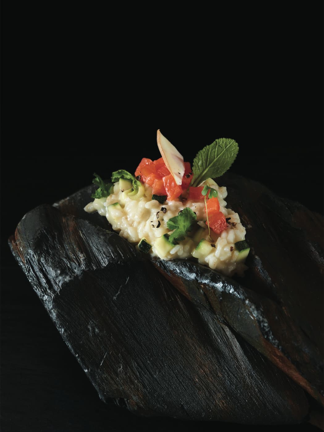 Risotto con salmone Upstream, ricotta affumicata ed erbe di Provenza